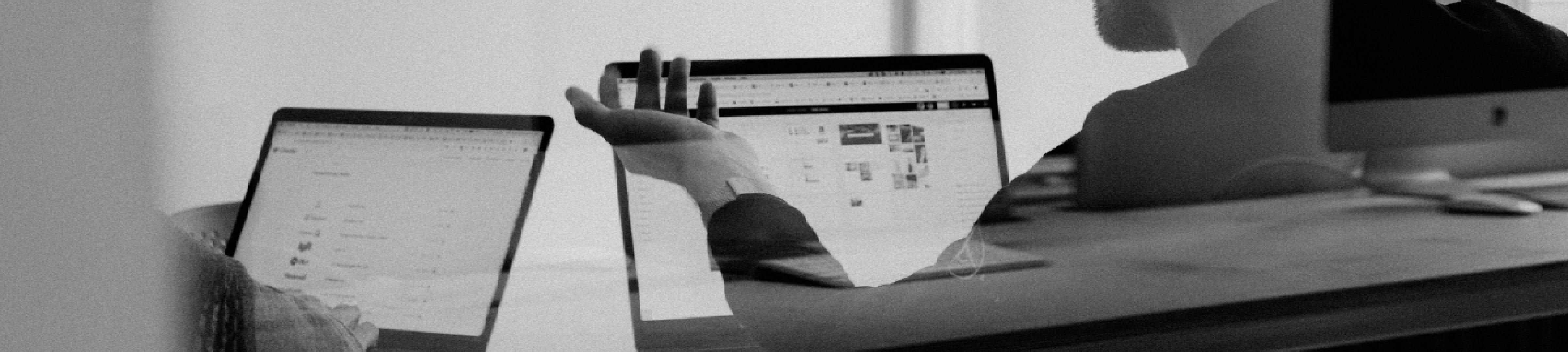 A photo of students working online in a quiet library working space